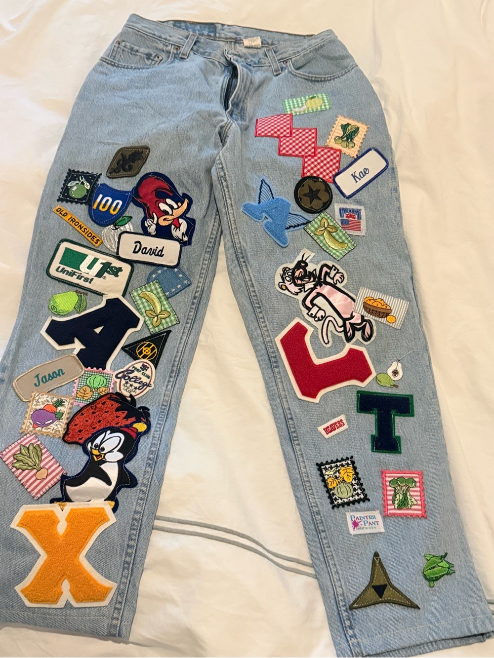 Levi's Light Blue Denim Jeans with patches and Red Tab